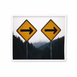 a picture of a mountain scene with two yellow arrows