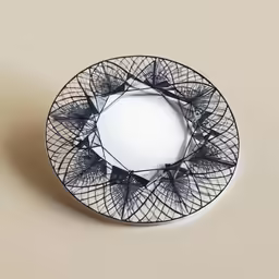 a black plate with a floral pattern on it