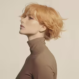 the profile of a woman with short, red hair wearing a turtle neck sweater