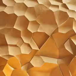a close up of an orange abstract wall pattern