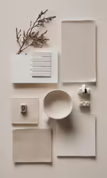 white objects arranged in a rectangle on a gray surface