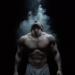 a man standing in the dark while wearing boxer shorts