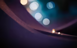 a close up photo of some colorful lights