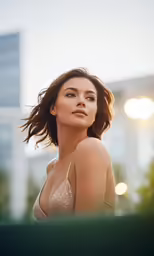 a young woman wearing a bikini in the sun