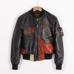 an image of a leather jacket that is worn on a hanger