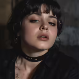 a woman with a choket and piercings on