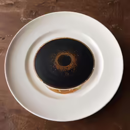 there is a black and brown substance inside of the cup
