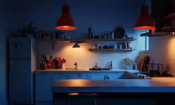 a modern kitchen with a wooden island in it