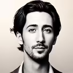 a man poses for a picture in black and white