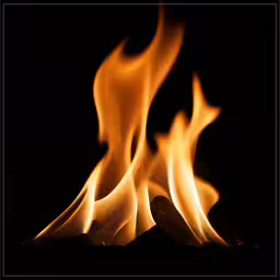 a flame is captured while it appears to be red or yellow