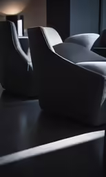 three black and white furniture sitting on top of a table