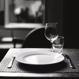 the white plate is sitting on the table