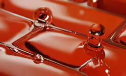 a red square object is shown in this artistic photo