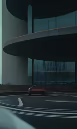 a car on the street by a big building