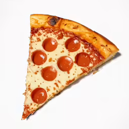 an uncooked slice of pizza with pepperoni and cheese on a white surface