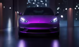 a purple car in an empty room with lights