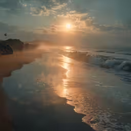 there is a sun on the horizon at the beach