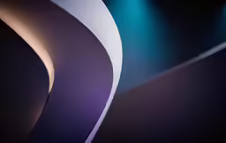 purple and white curves against blue background