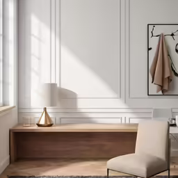 a large window is above the desk in this bedroom