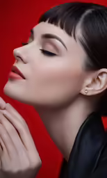 an image of a woman with her hands on her face