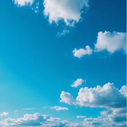 the boat is in the blue ocean on a clear day