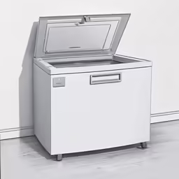 a chest freezer that is sitting in the ground