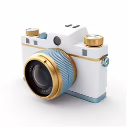 an antique camera with gold rims and lens