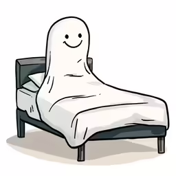 a bed with a face on it and a blanket