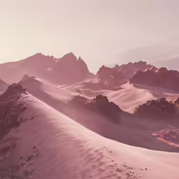 a desert landscape with mountains in the distance