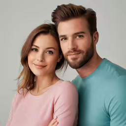 a man and a woman posing for a portrait