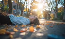 a girl lies down with her eyes closed and eyes closed