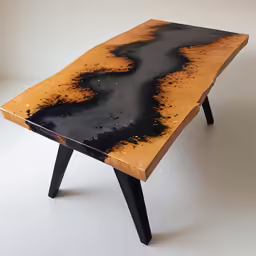 a wooden table with an oil painted design on top