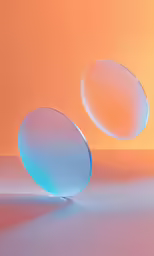 two blue and white round pieces of glass