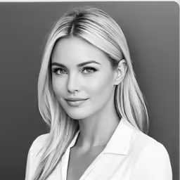 a woman with blonde hair wearing a white shirt