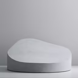 an object on a table with a gray background
