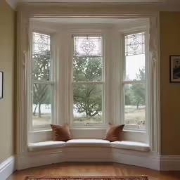 an oval window in the corner of a room