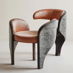 a grey chair that has brown leather on it