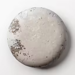 the old dirty object is sitting on the floor