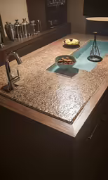 a modern kitchen is lit with a recessed lighting