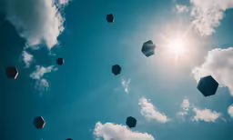 a lot of cubes floating in the air on a sunny day