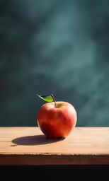 an apple is sitting on the wooden table
