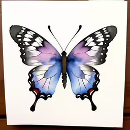 a colorful butterfly in a white square is being displayed,a butterfly painted in purple and white on top of paper,a butterfly painted on a card in blue and purple,the drawing is of a purple butterfly,a butterfly with long wings sitting on a white card