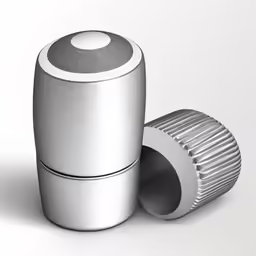 two silver objects on top of each other