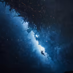 a couple of people flying through the air in the sky