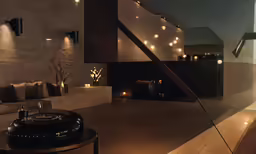 the living room has two lights that look as though they are from other side