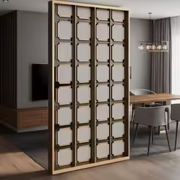 a tall sliding door has decorative glass panels
