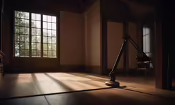 a floor lamp is on in a dimly lit room