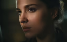 a close up of the face of a woman