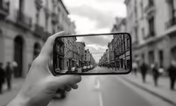 someone is taking a picture of the streets and buildings in an iphone app