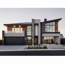 modern house with two large garages and tall windows